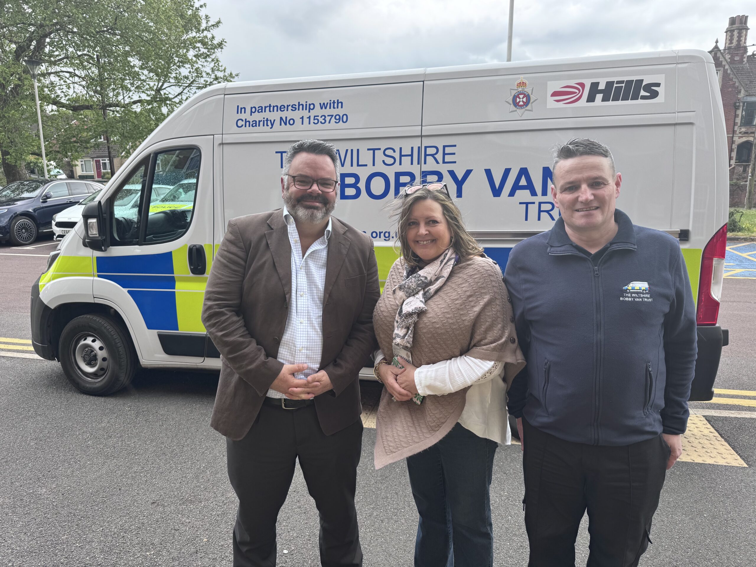 Photograph showing representatives from The Hills Group and the Wiltshire Bobby Van Trust